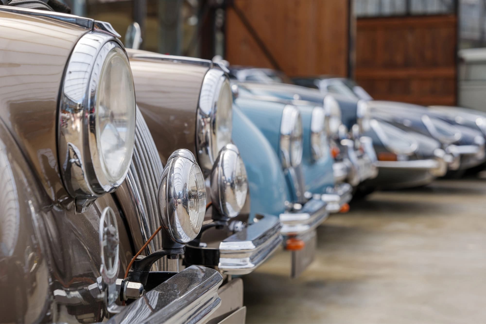 Vintage cars all lined up in a row