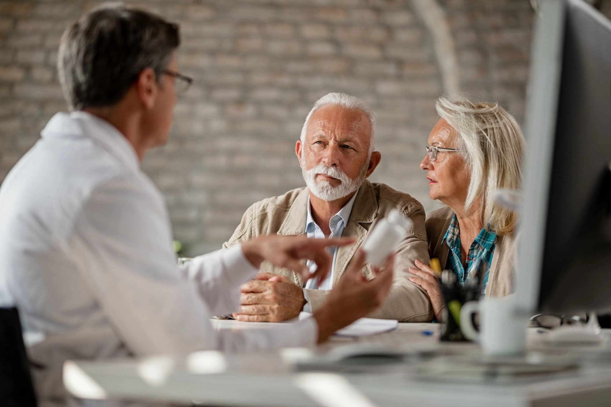 Older couple seeing a financial advisor for estate planning in Texas