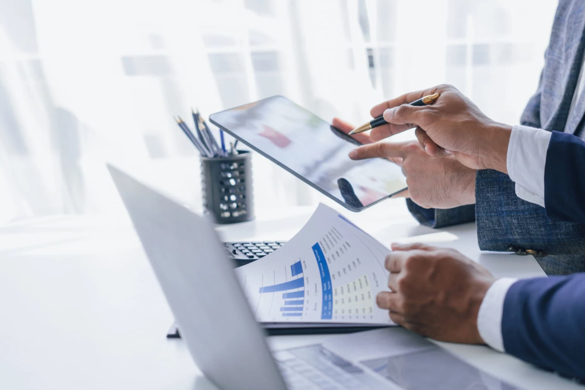 a private credit investor reviewing strategy with a wealth advisor
