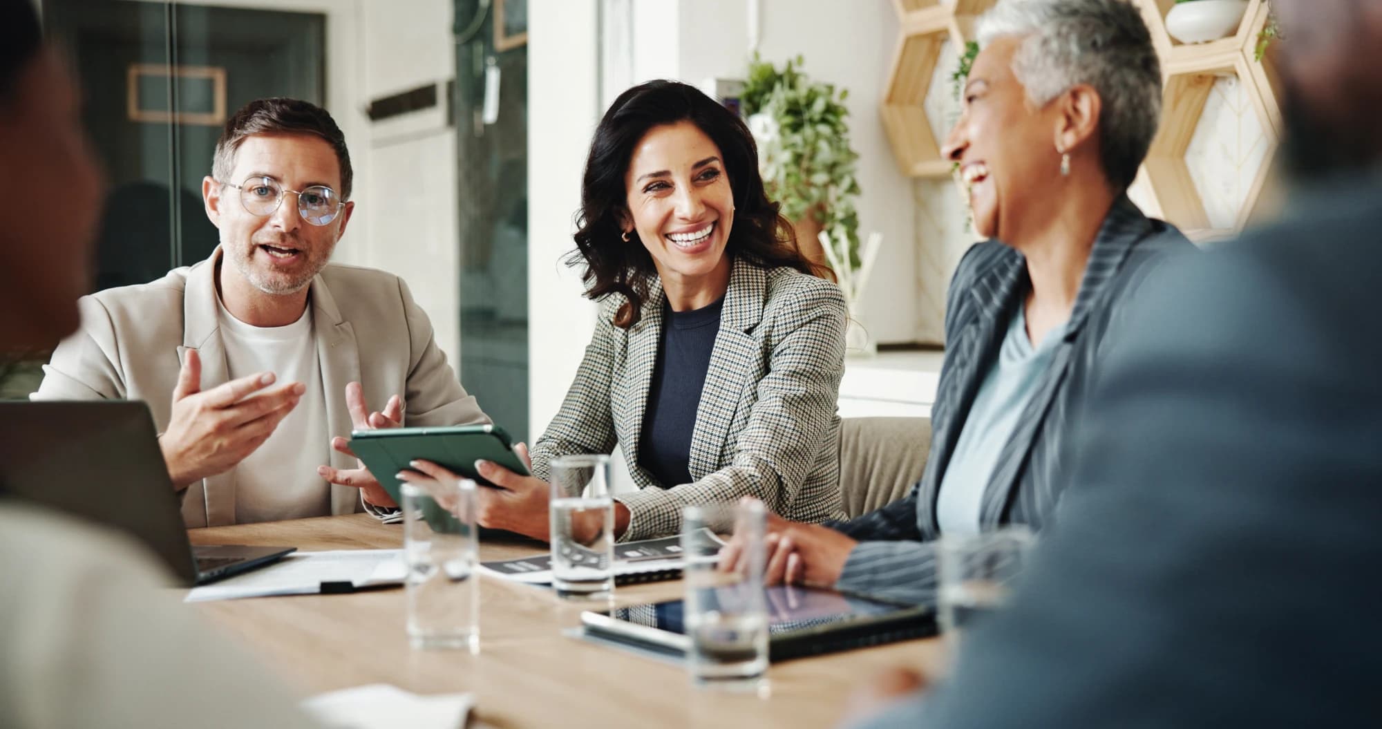 A corporate trustee representative meeting with a family