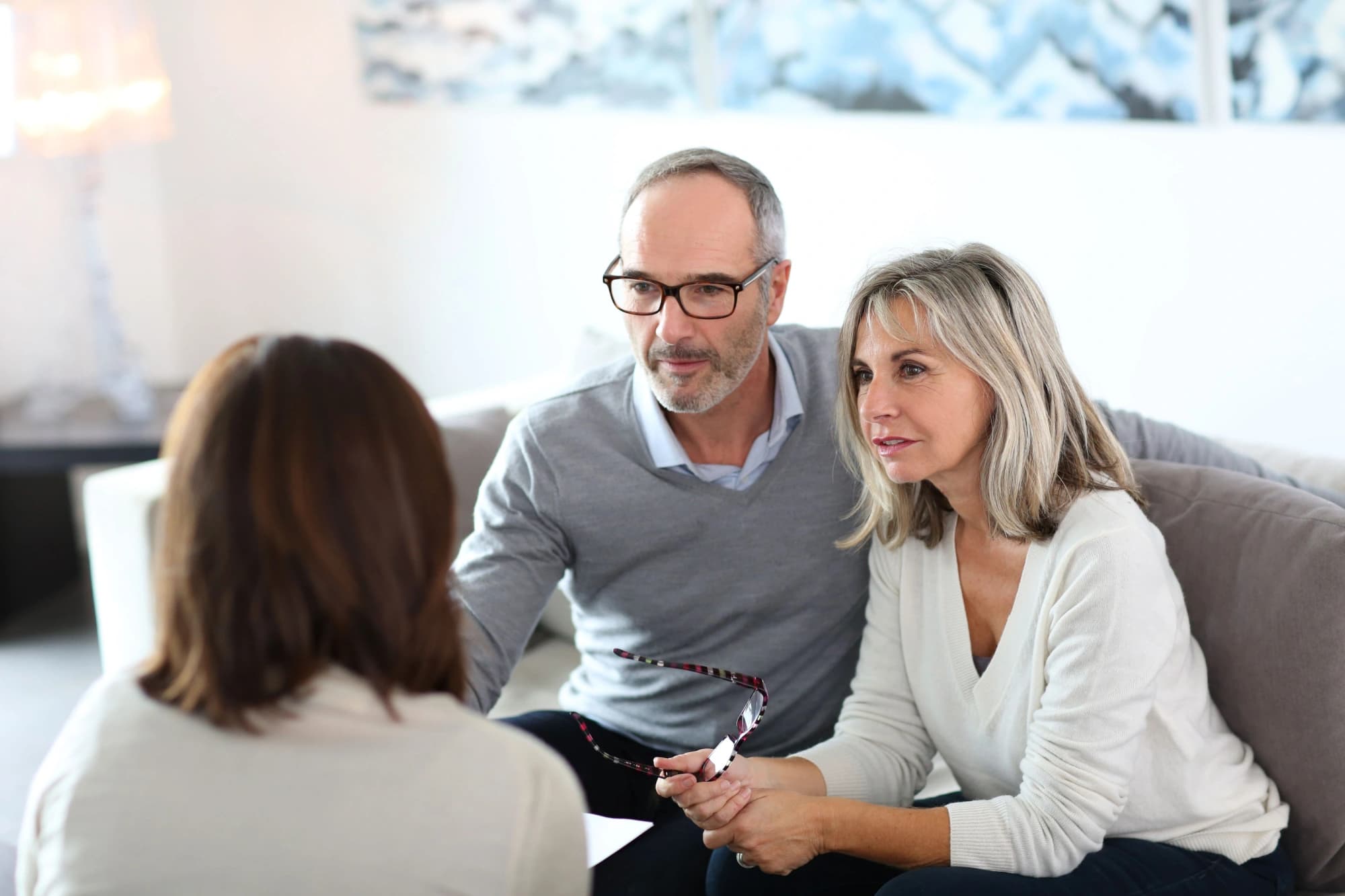 Senior couple meeting with a financial tax advisor