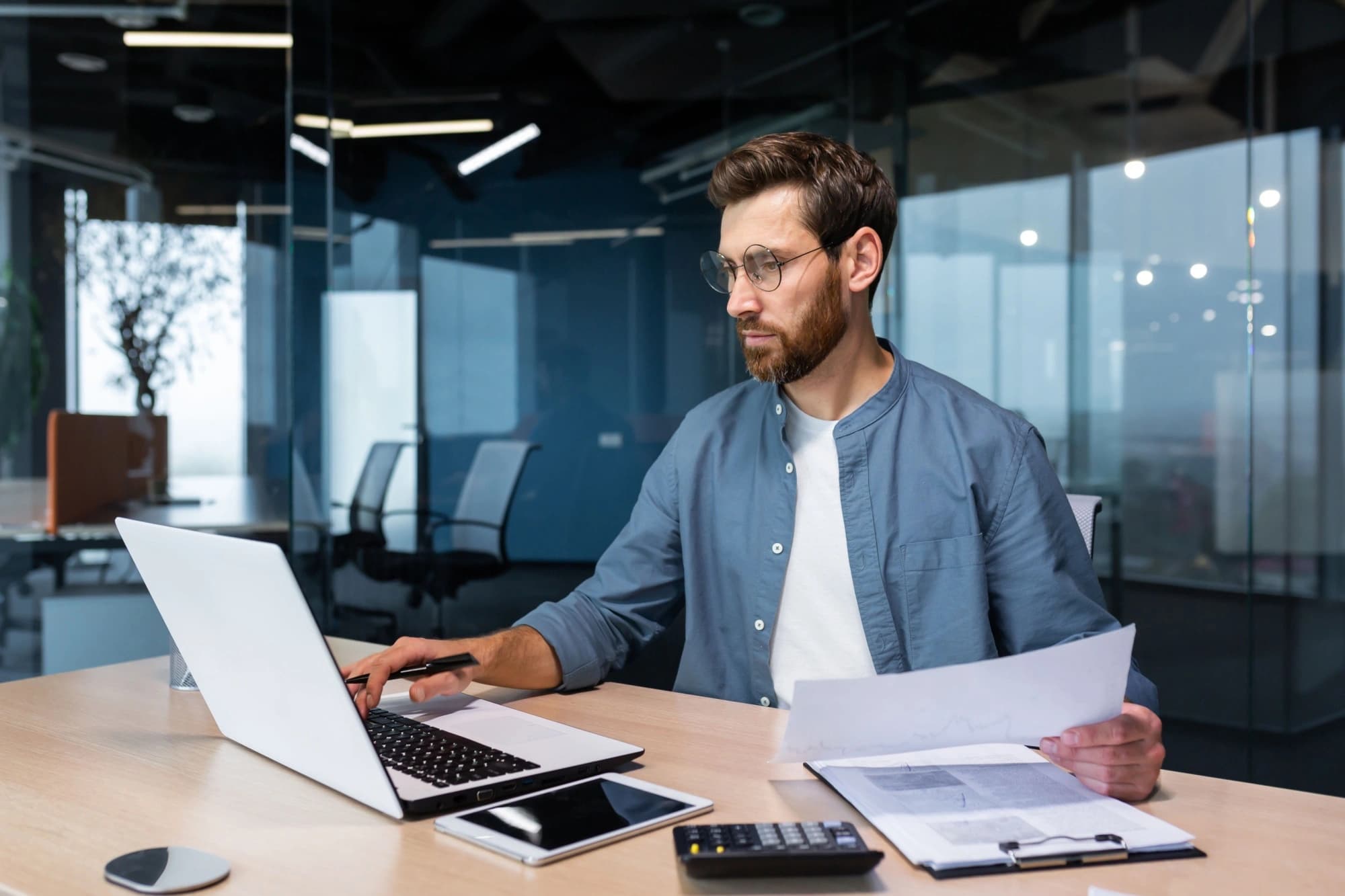 financial planner working on a client’s tax plan