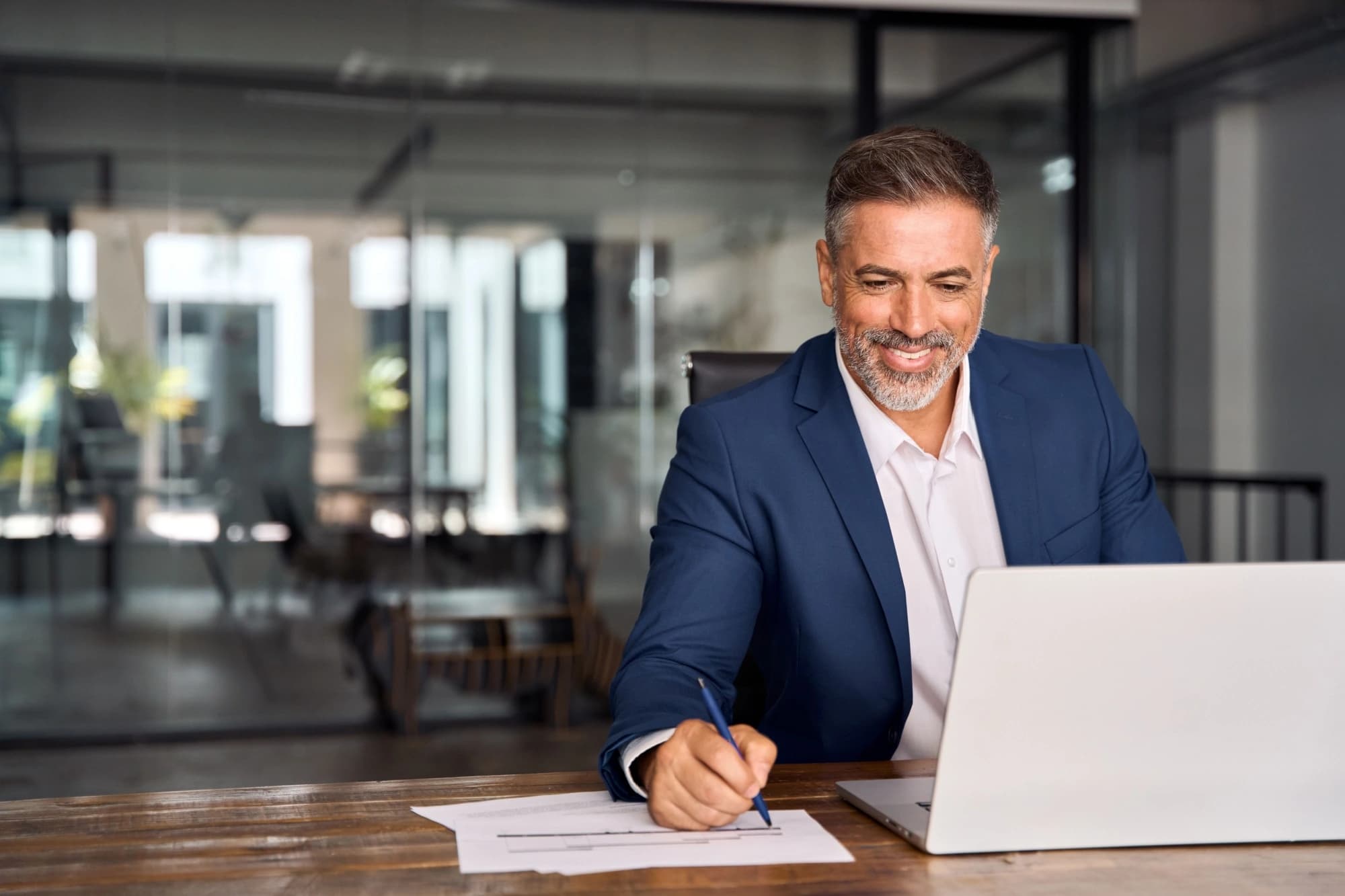 Professional, middle-aged Hispanic man updating his estate plan