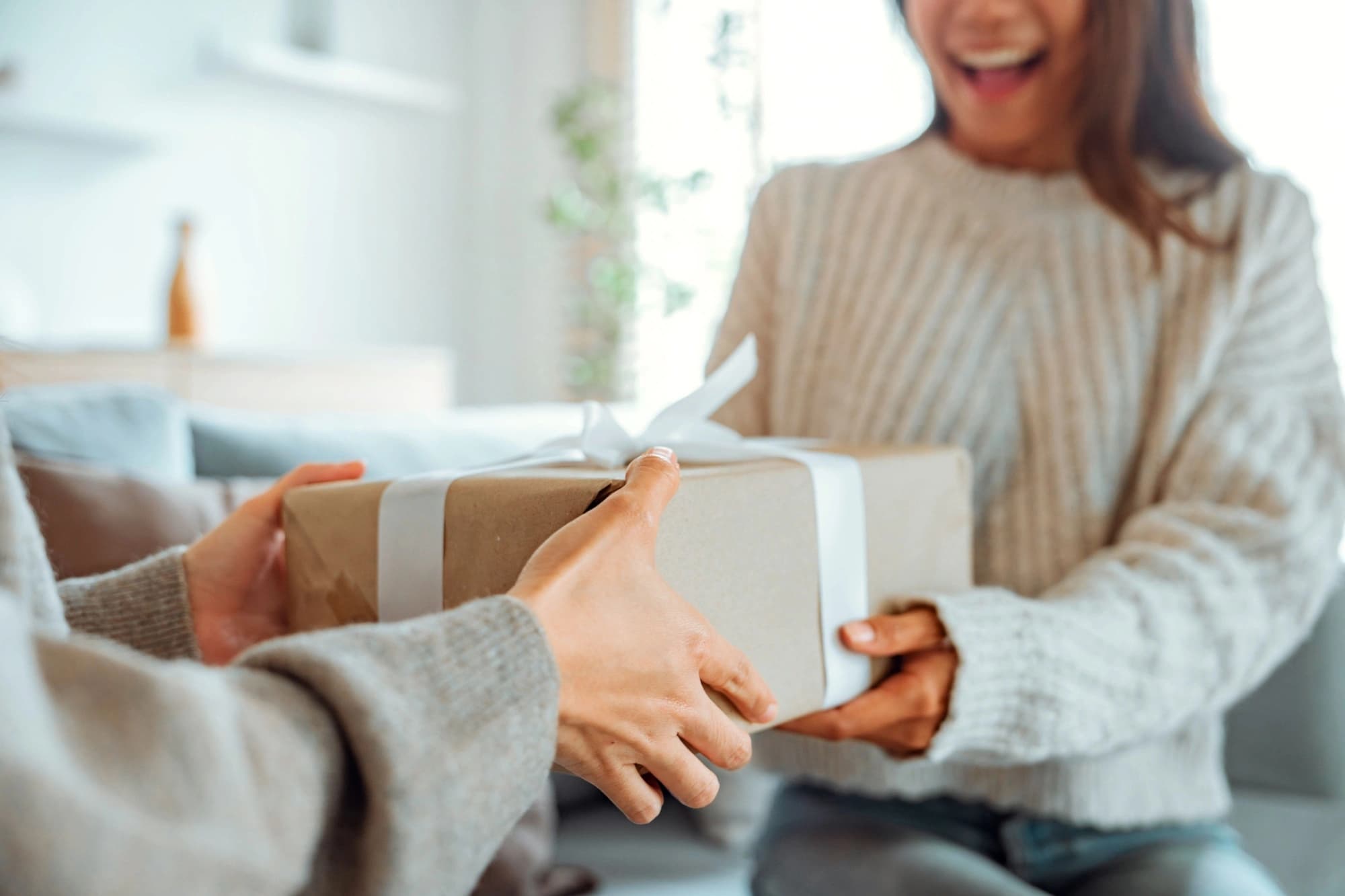 Excited woman getting a gift