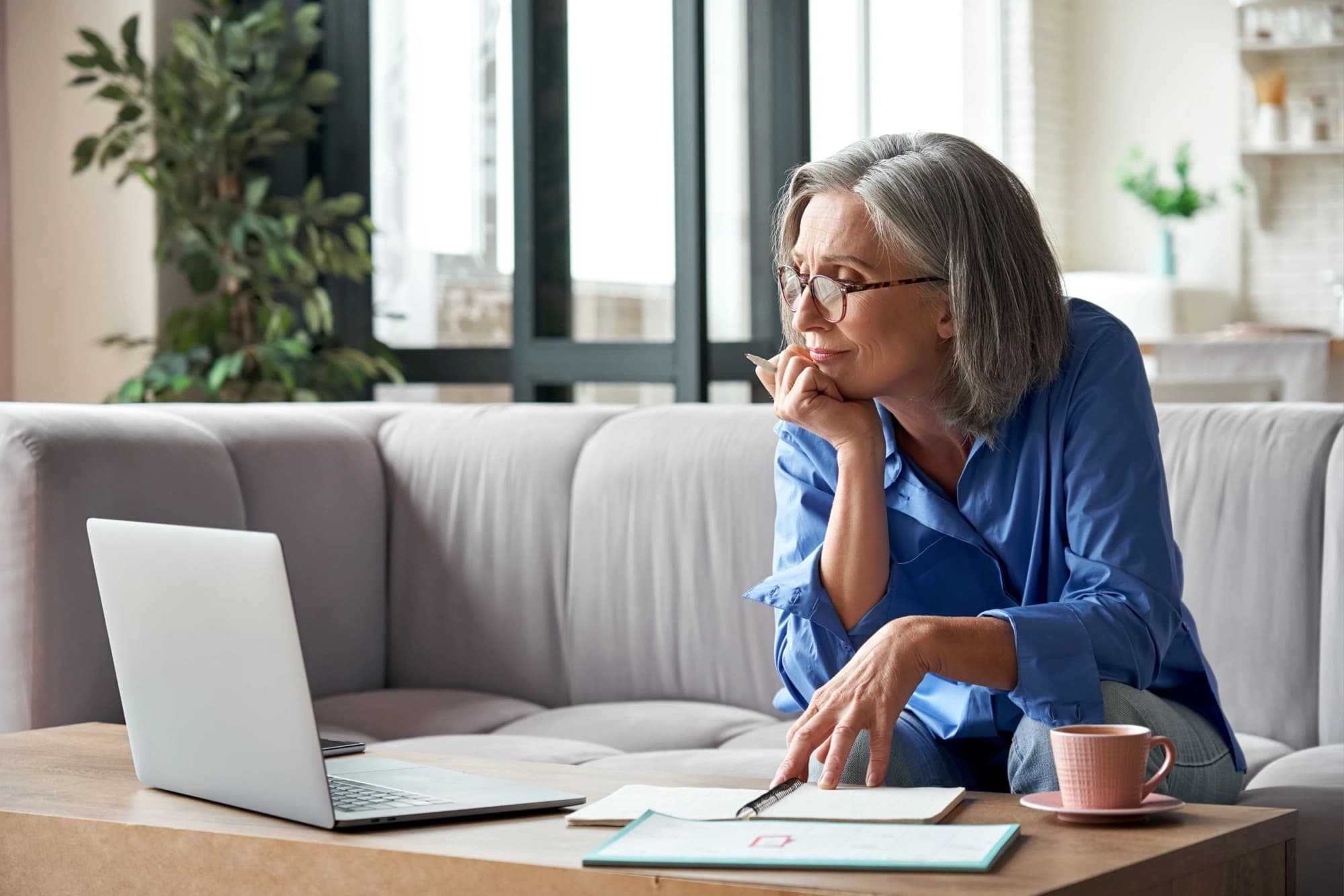 Older woman reviewing her charitable giving strategy