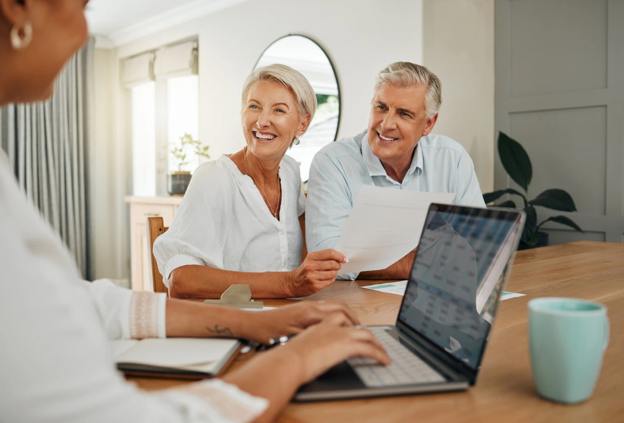 Happy older couple retirement planning