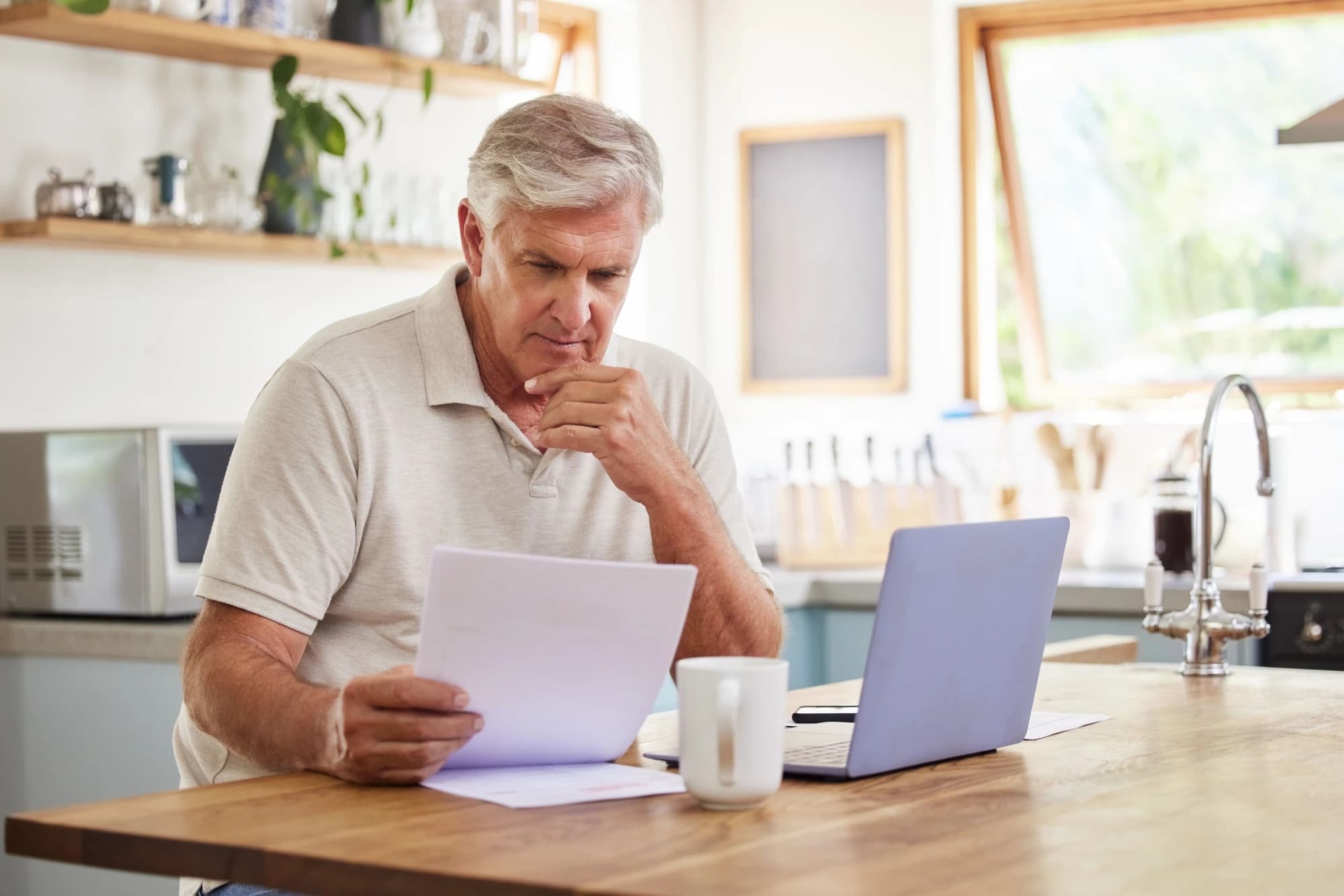 A man reviewing his retirement accounts