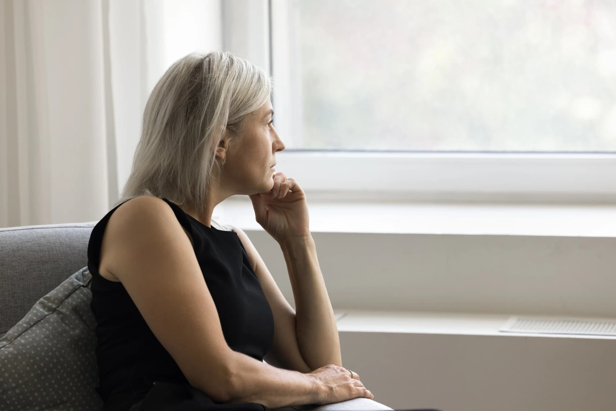 A woman grieving the loss of her spouse