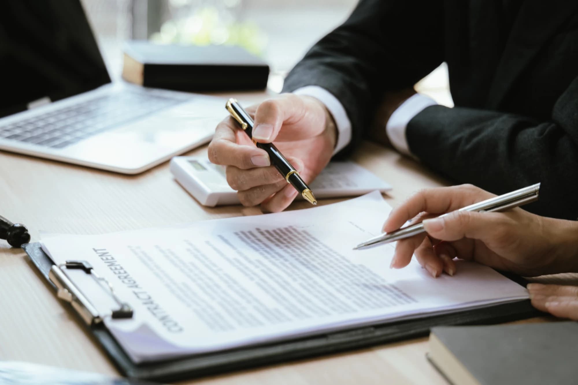a fund manager and investor reviewing a side letter