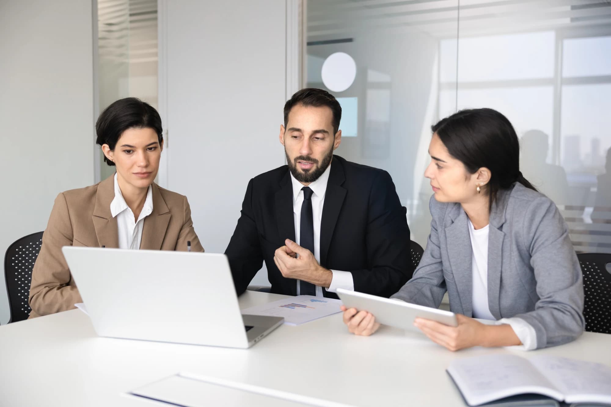 Houston-based wealth advisory team talking to a client