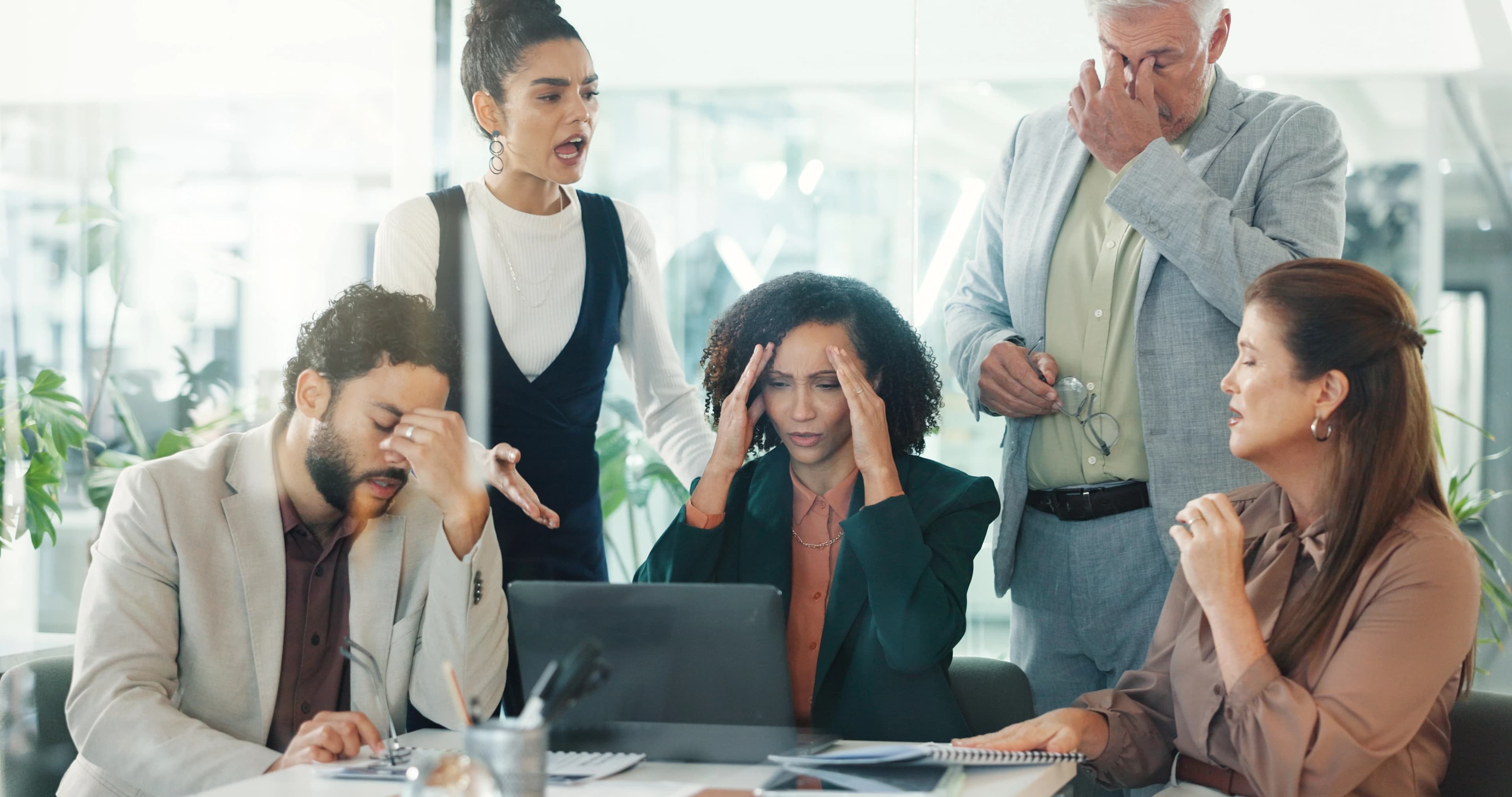 Members of a frustrated financial team